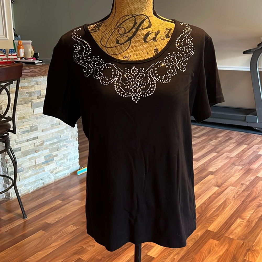 Size L black tee with a rhinestone design arou neck line
